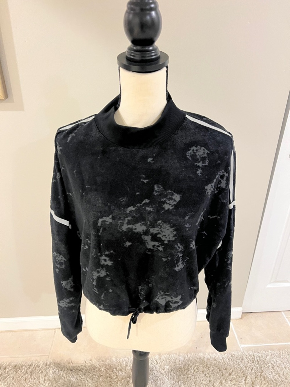 Nike Black Pullover with White Stripe Accents cropped sweatshirt.